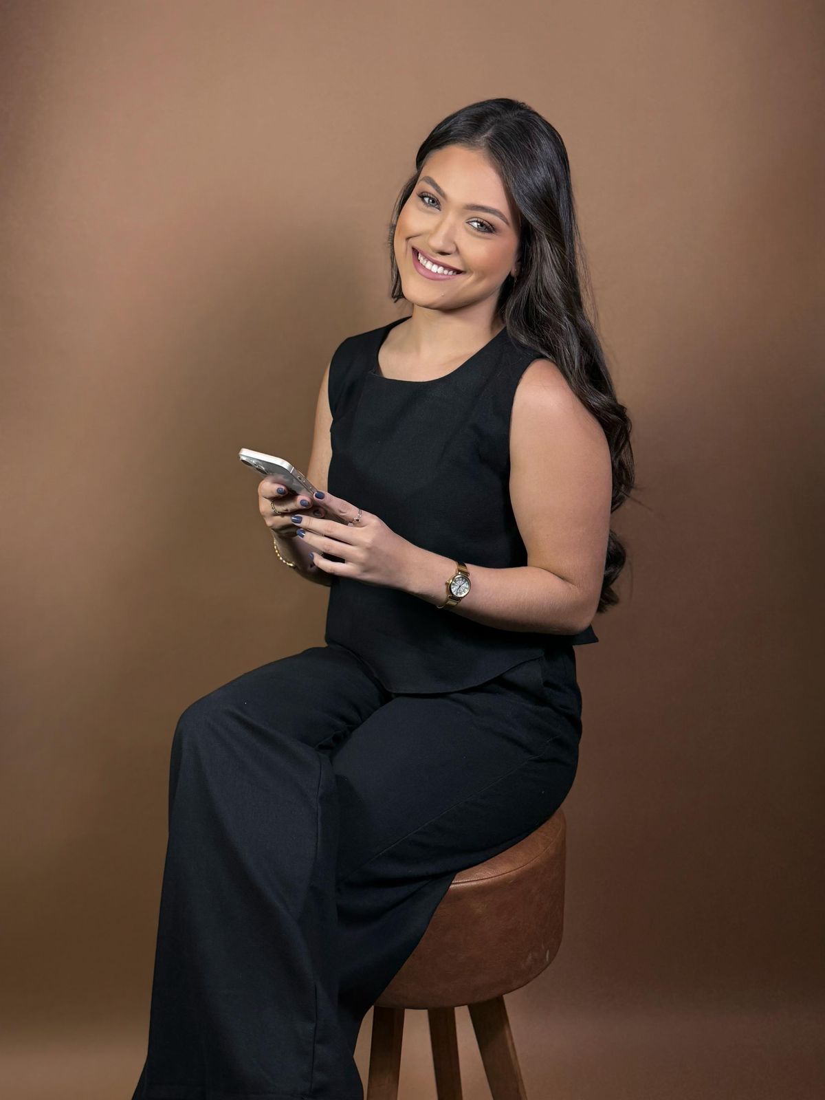 Psicóloga Nicolly Contro Ferreira em seu consultório